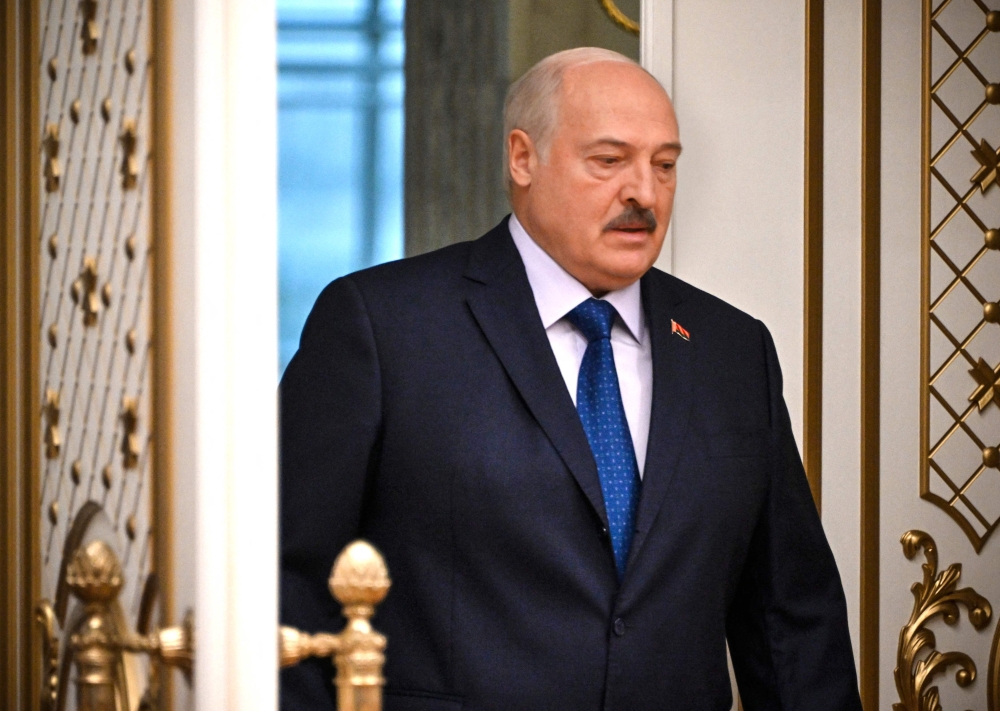 Belarus' President Alexander Lukashenko arrives to meet with foreign media at his residence, the Independence Palace, in the capital Minsk on July 6, 2023.  Photo by Alexander NEMENOV / AFP