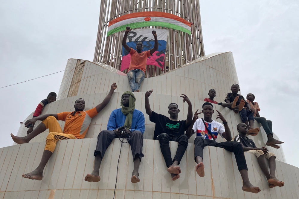 Supporters of the Nigerien defence and security forces gather during a demonstration outside the national assembly in Niamey on July 27, 2023. (Photo by AFP)
