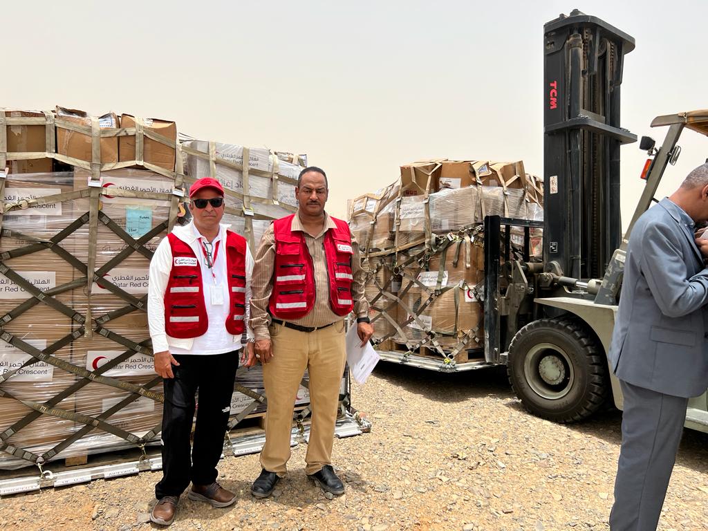 QRCS officials with some of the consignments for the displaced people in Sudan.
