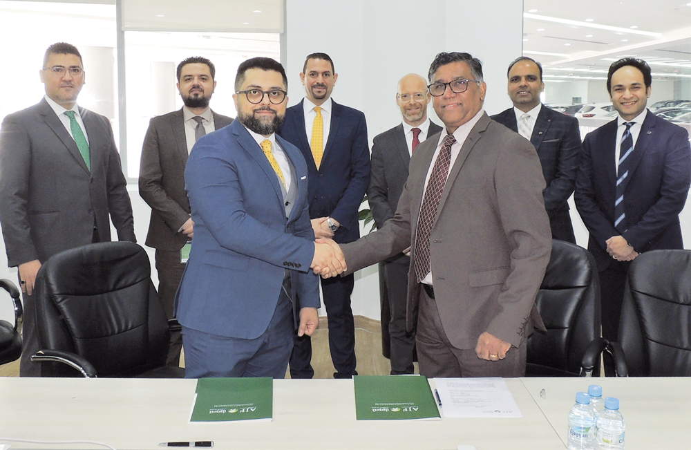 Officials from Domasco and Al Jazeera Finance during the agreement signing ceremony.