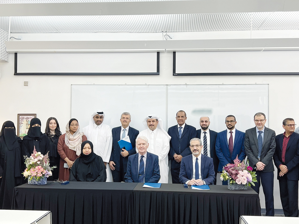 HBKU and PHCC officials during the agreement signing ceremony.