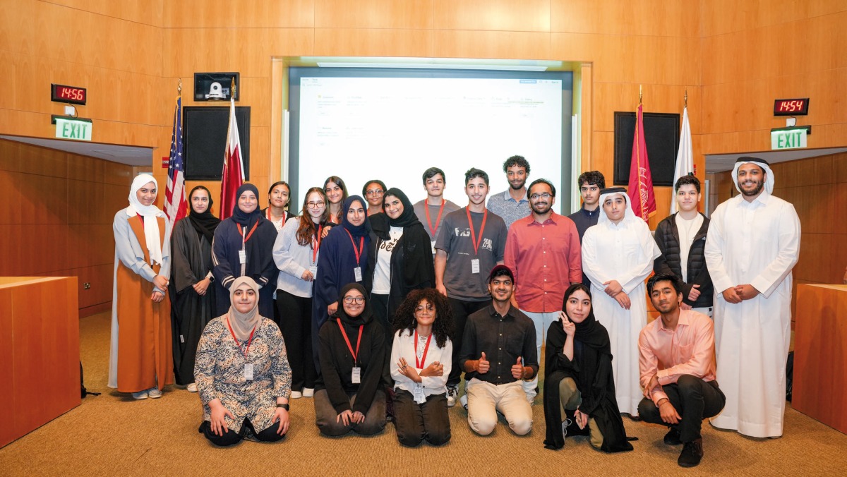 High school students who completed the Physics for Future Doctors Summer Programme pose for a photograph.