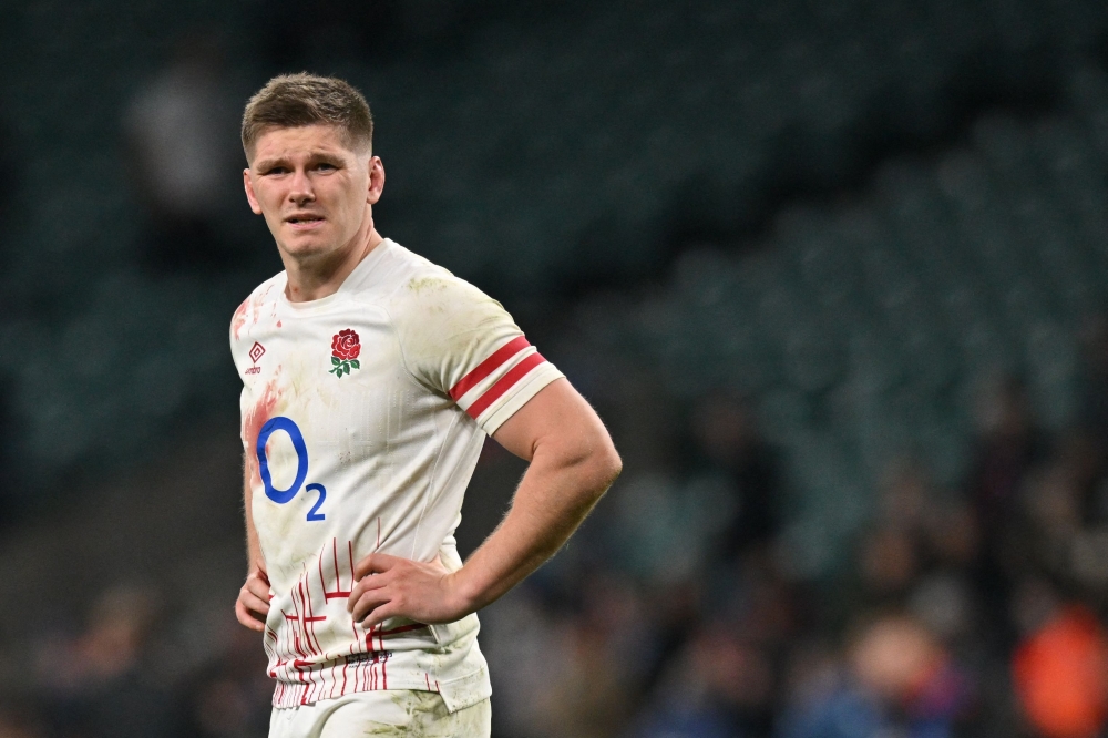 (FILES) England's centre Owen Farrell reacts at the end of the Six Nations international rugby union match between England and Scotland at Twickenham Stadium, west London, on February 4, 2023. (Photo by Glyn KIRK / AFP)
