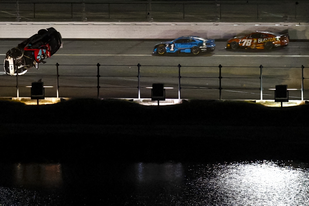 Ryan Preece, driver of the #41 RaceChoice.com Ford, flips after an on-track incident during the NASCAR Cup Series Coke Zero Sugar 400 at Daytona International Speedway on August 26, 2023 in Daytona Beach, Florida. Sean Gardner/Getty Images/AFP (Photo by Sean Gardner / GETTY IMAGES NORTH AMERICA / Getty Images via AFP)