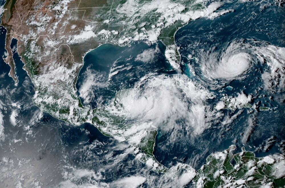 This image obtained from the National Oceanic and Atmospheric Administration (NOAA), shows ropical Storm Idalia (C) off the coast of Mexico on August 279, 2023, at 21:20:20 UTC. Photo by NOAA/RAMMB / AFP