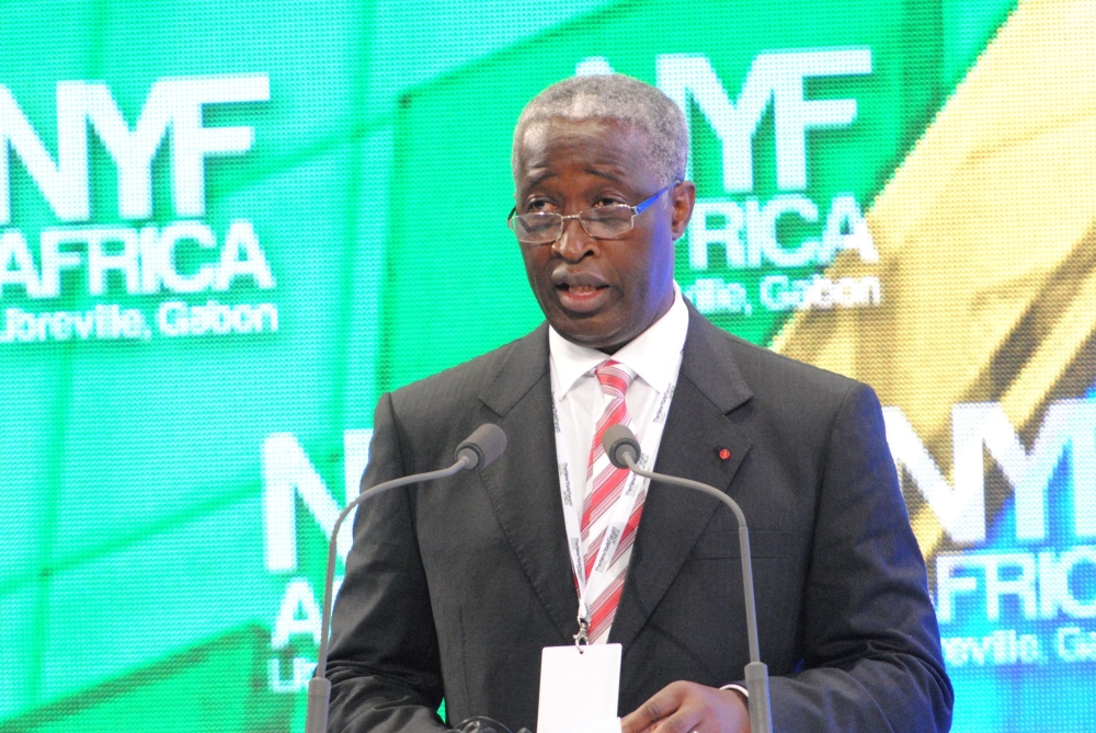 File Photo: Gabon's Prime Minister Raymond Ndong Sima speaks during the opening session of the New York Forum Africa in Libreville on June 8, 2012. (Photo by Wilfried Mbinah / AFP)