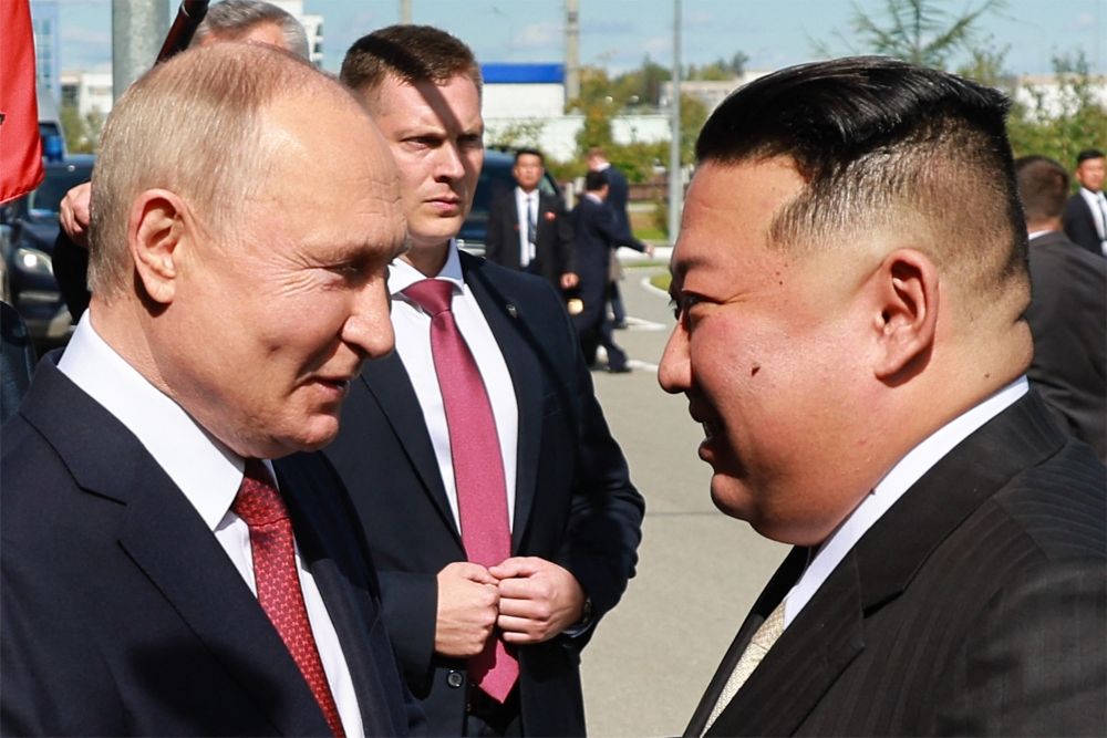 Russia's President Vladimir Putin (left) and North Korea's leader Kim Jong Un during their meeting at the Vostochny Cosmodrome in Amur region on September 13, 2023. (Photo by Vladimir Smirnov / Sputnik Agency-POOL / AFP)