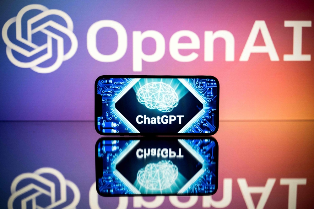 In this file photo taken on January 23, 2023 in Toulouse, southwestern France, shows screens displaying the logos of OpenAI and ChatGPT. Photo by Lionel BONAVENTURE / AFP

