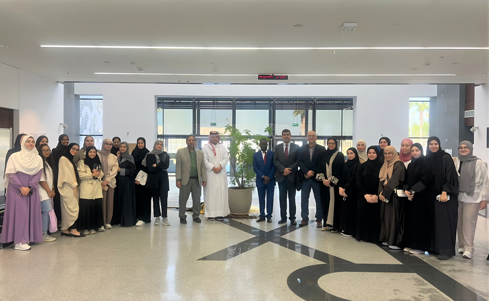 Faculty and students at the gardening ceremony.
