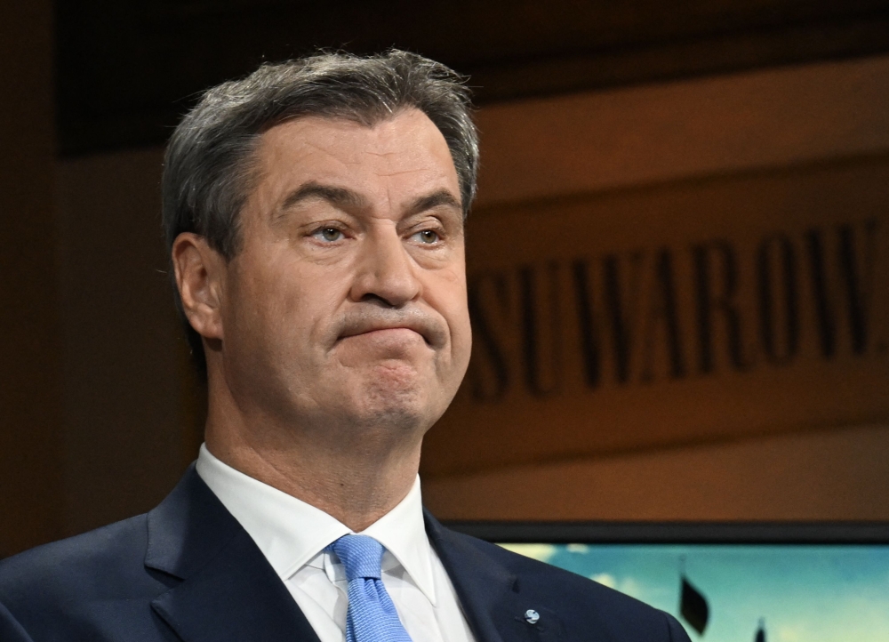 Bavaria's State Premier and top candidate of the conservative Christian Social Union (CSU) party Markus Soeder takes part in a TV talk at the Bavarian State Parliament in Munich, southern Germany, after first exit polls were released of regional elections in the southern federal state of Bavaria on October 8, 2023. (Photo by CHRISTOF STACHE / AFP)
