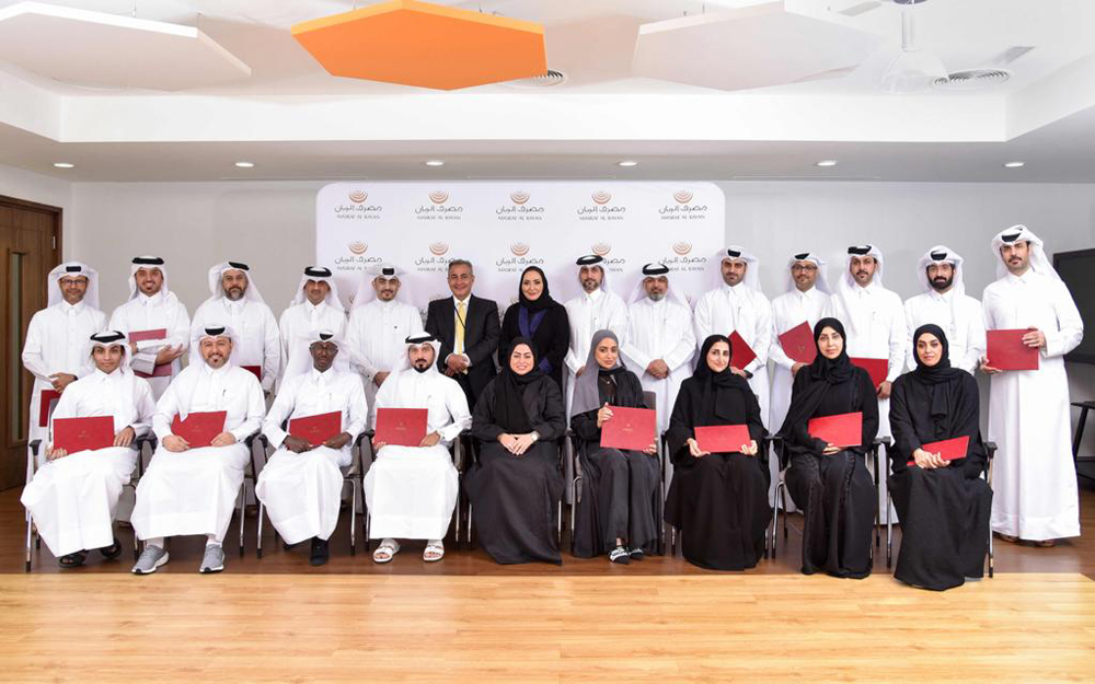 Masraf Al Rayan officials pose for a group photo to celebrate graduation in line with training program entitled,‘Bank Branch Management’.