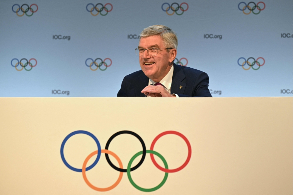 International Olympic Committee (IOC) President Thomas Bach speaks during a press conference on the second day of the 141st IOC session in Mumbai on October 16, 2023. (Photo by INDRANIL MUKHERJEE / AFP)