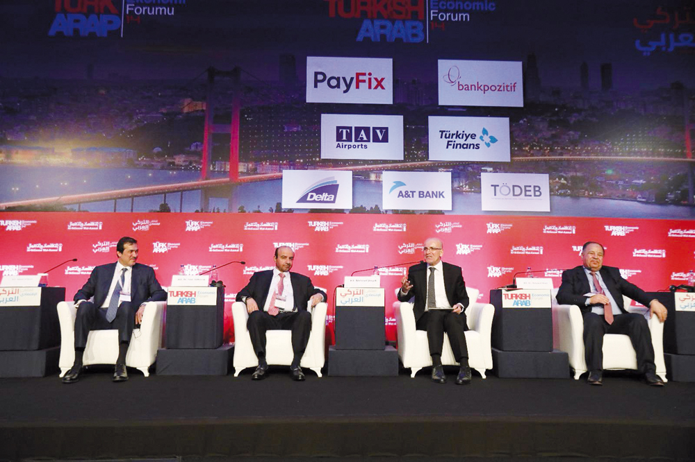 Minister of State and Chairman of Qatar Free Zones Authority (QFZ) H E Ahmad Al Sayed (first left), Turkish Treasury and Finance Minister H E Mehmet Simsek with other officials during the 14th Turkish-Arab Economic Forum, in Istanbul.