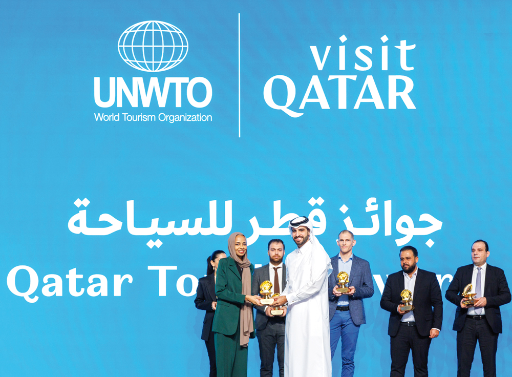 Amel Mahgoub, Head of Marketing & Communication, receiving the award on behalf of Cafe #999 team.