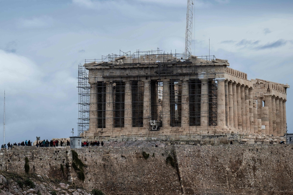A photograph shows the Parthenon Temple at the top of the Acropolis hill in Athens on November 28, 2023. Greek Prime Minister Kyriakos Mitsotakis expressed his 