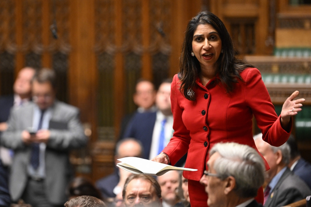 A handout photograph released by the UK Parliament shows Britain's former Home Secretary Suella Braverman making a statement in the House of Commons in London on December 6, 2023. Photo by Maria Unger / UK Parliament / AFP