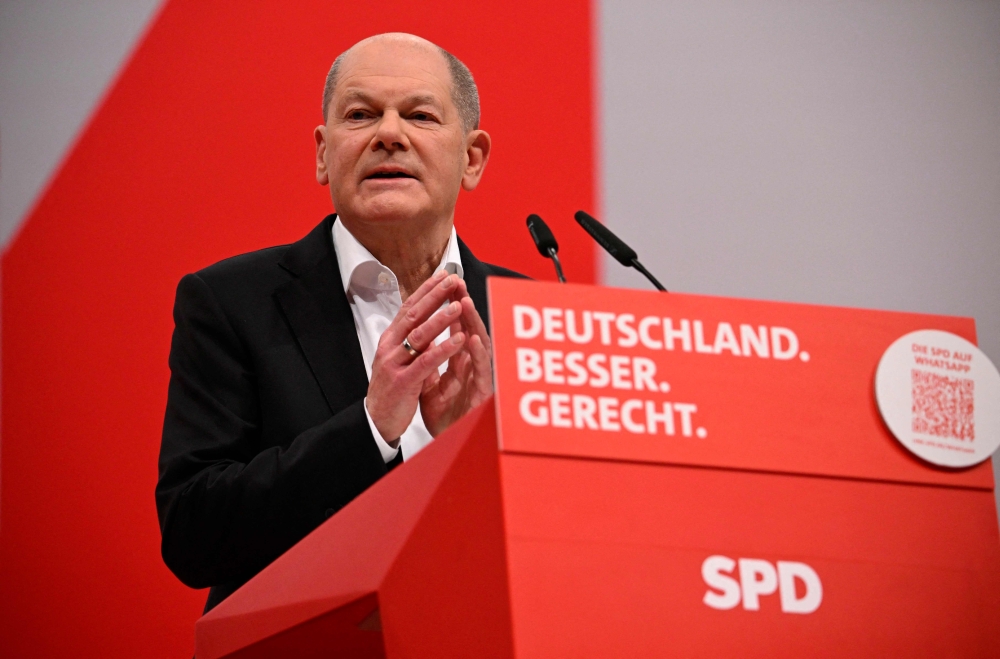 German Chancellor Olaf Scholz gives a speech during the party congress of his social democratic SPD party in Berlin on December 9, 2023. (Photo by Tobias SCHWARZ / AFP)
 