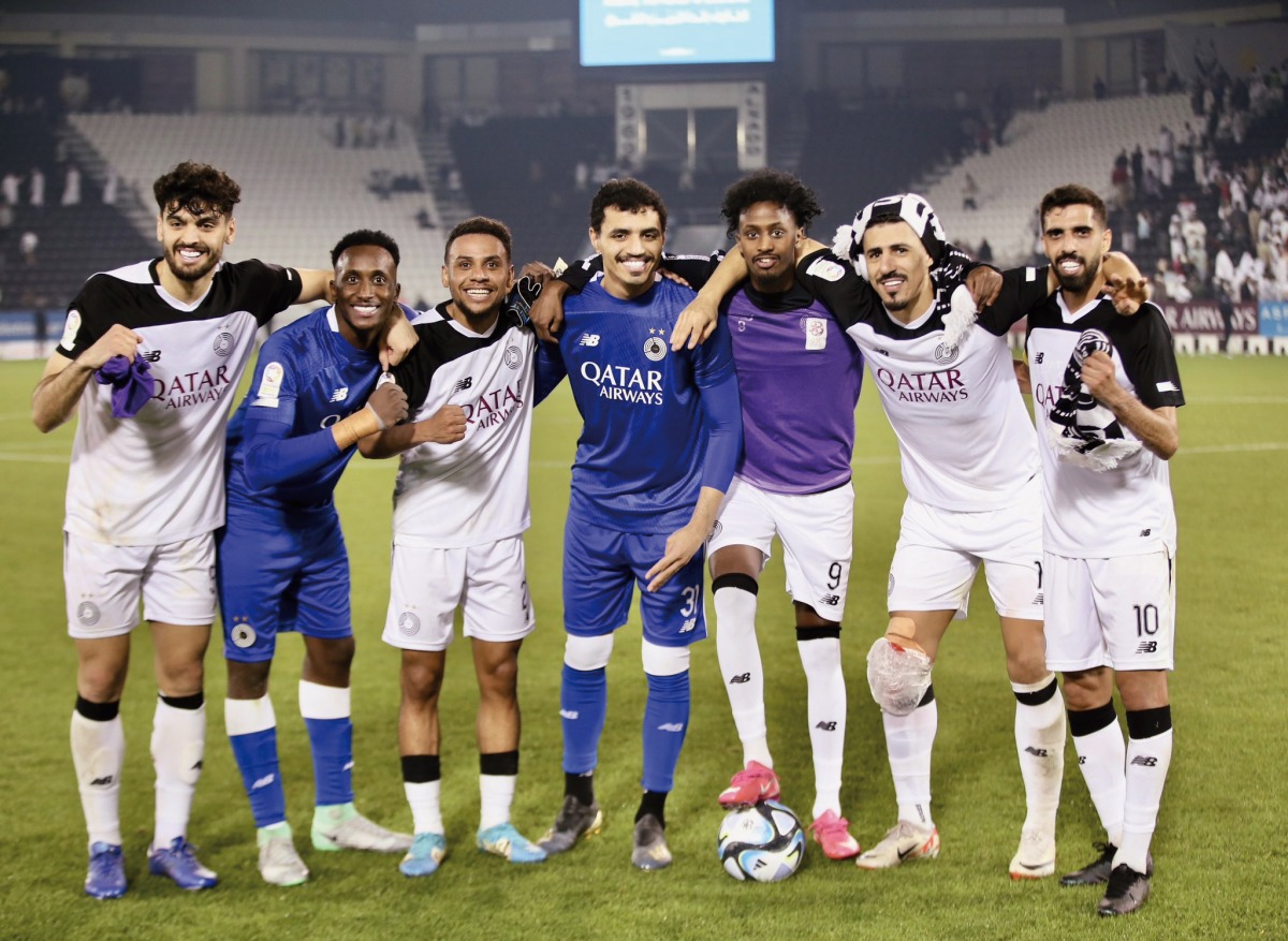 Al Sadd players celebrate after winning Qatar Clasico. 