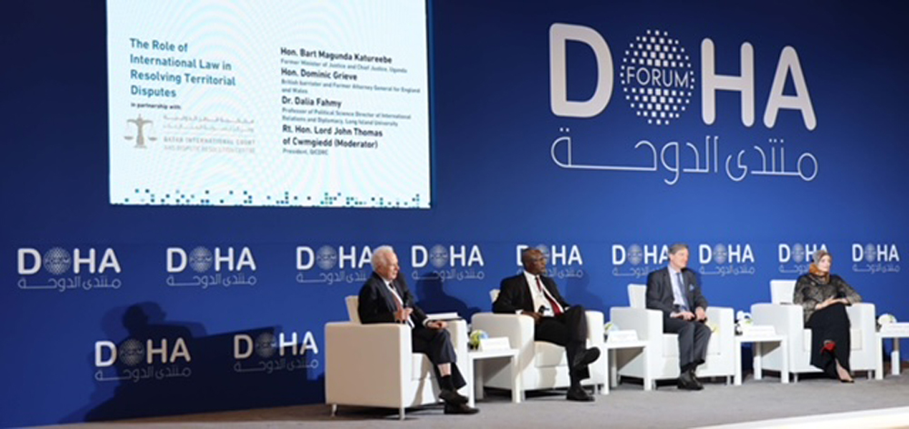 Lord Thomas of Cwmgiedd, Bart Katureebe, Dominic Grieve and Dr. Dalia Fahmy during the panel discussion at the Doha Forum 2023.