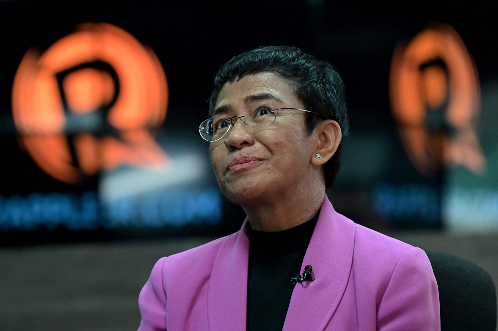 This file photo taken on January 18, 2023 shows Nobel Laureate Maria Ressa talking during an interview with AFP at Rappler offices in Pasig, Metro Manila. Photo by JAM STA ROSA / AFP