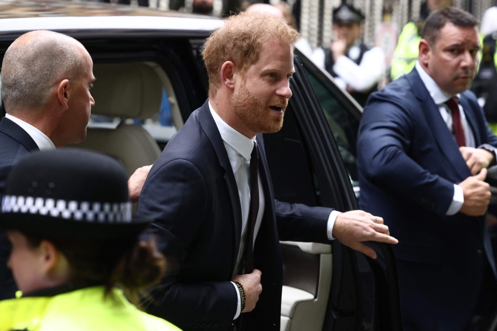 File: Britain's Prince Harry, Duke of Sussex, arrives to the Royal Courts of Justice, Britain's High Court, in central London on June 6, 2023. (Photo by Henry Nicholls / AFP)