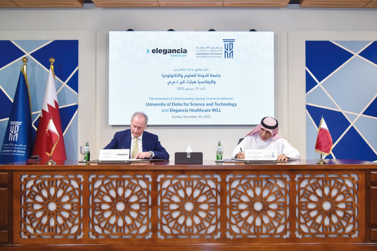 UDST President Dr. Salem Al Naemi (right) and Chief Executive Officer of Elegancia Healthcare, Joseph Hazel, signing the MoU. 
