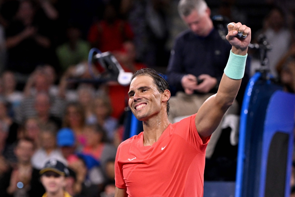 Spain's Rafael Nadal celebrates winning his men's singles match against Austria's Dominic Thiem at the Brisbane International tennis tournament in Brisbane on January 2, 2024. (Photo by William West / AFP)