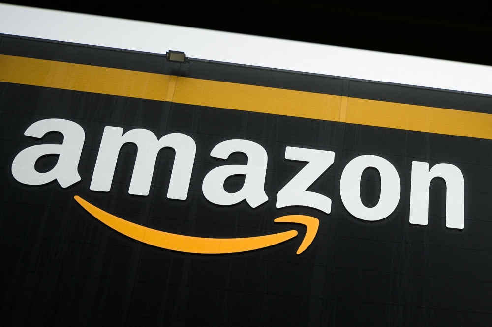 (Files) This picture taken on October 22, 2019, shows the logo of Amazon on a new warehouse in Bretigny-sur-Orge. (Photo by Philippe Lopez / AFP)
