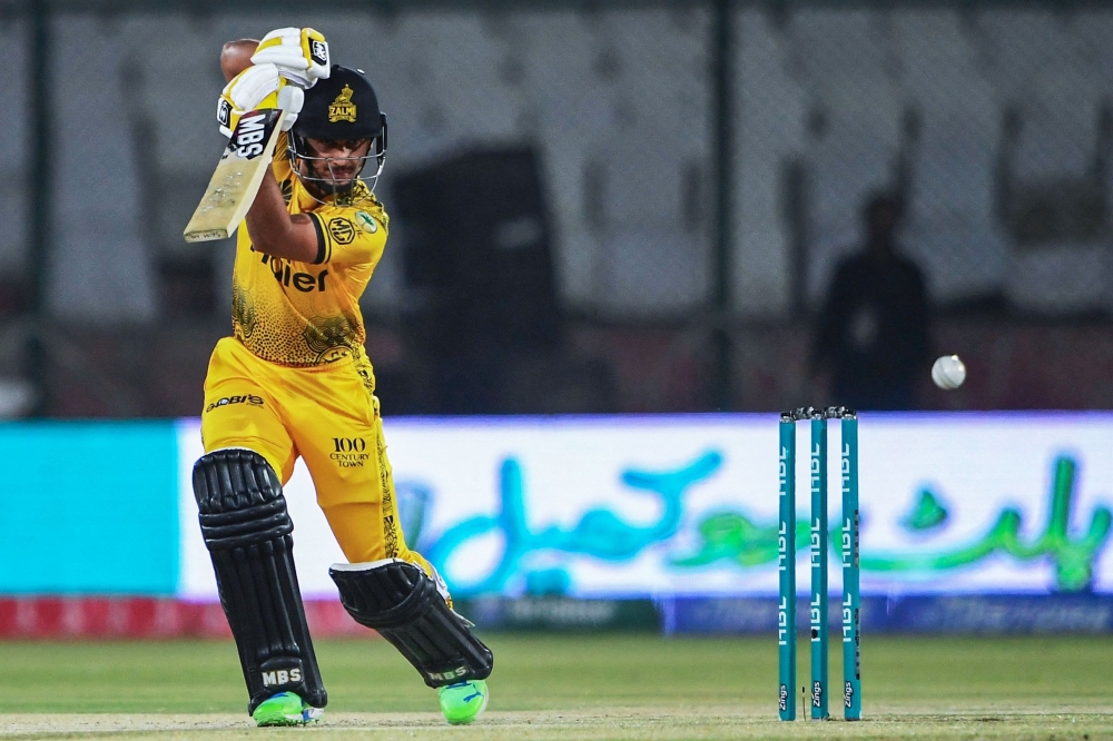 Peshawar Zalmi's Saim Ayub plays a shot during the Pakistan Super League (PSL) Qualifier Twenty20 cricket match between Multan Sultans and Peshawar Zalmi at the National Stadium in Karachi on March 14, 2024. (Photo by Asif Hassan / AFP)