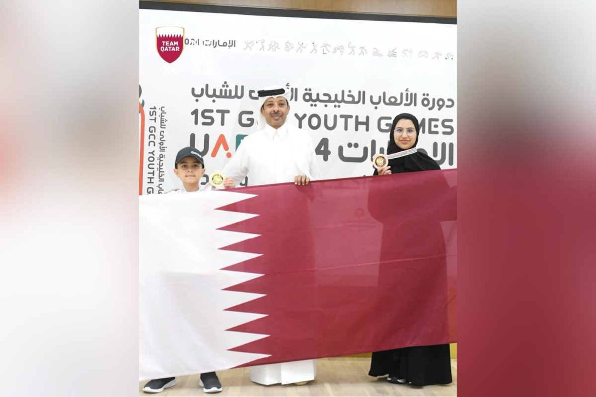 President of Qatar Chess Federation Mohammed Al Madhahka with gold medal winner Khaled Al Jamaat (left) and Rawda Al Qasabi, who claimed bronze medal. 
