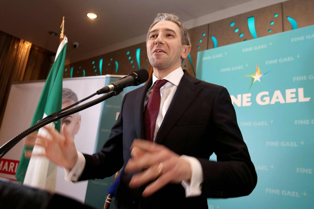 File photo: New Fine Gael leader Simon Harris speaks at a convention in Athlone, central Ireland on March 24, 2024, after being declared leader and de facto prime minister-in-waiting. (Photo by Paul Faith / AFP)