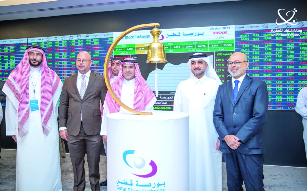 QSE CEO Abdulaziz Nasser Al Emadi along with other official during the bell ringing ceremony.