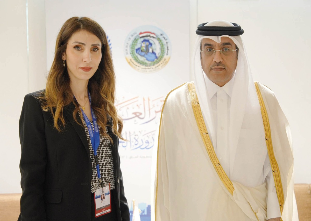Minister of Labour H E Dr. Ali bin Smaikh Al Marri with Palestinian Minister of Labour H E Dr. Enas Al Attari.