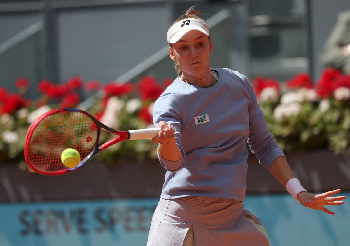 Kazakhstan's Elena Rybakina returns the ball to Kazakhstan's Yulia Putintseva during the 2024 WTA Tour Madrid Open tournament quarter-final tennis match at Caja Magica in Madrid on May 1, 2024. (Photo by PIERRE-PHILIPPE MARCOU / AFP)
