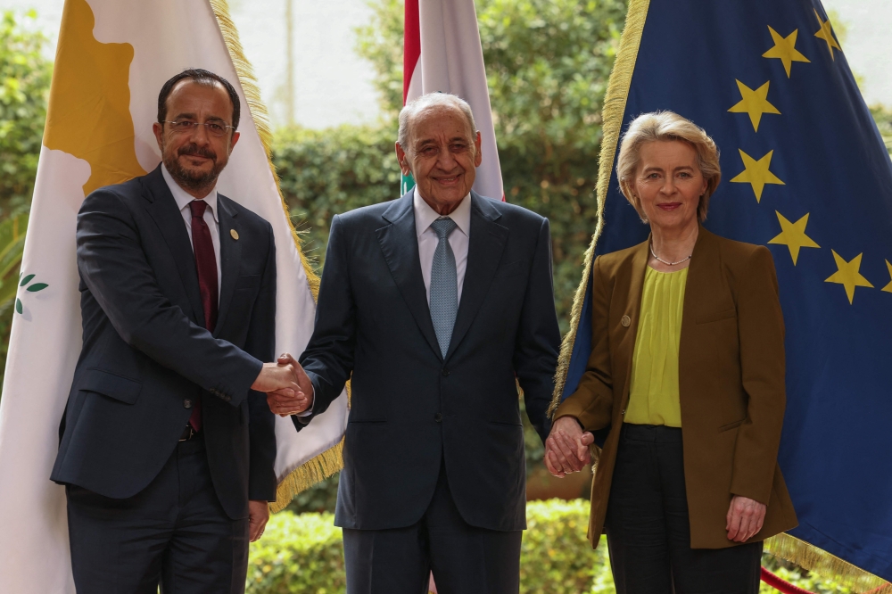 Lebanon's Parliament Speaker Nabih Berri (C) poses for pictures with European Commission President Ursula von der Leyen (R) and Cypriot President Nikos Christodoulides in Beirut on May 2, 2024. (Photo by Anwar Amro / AFP)