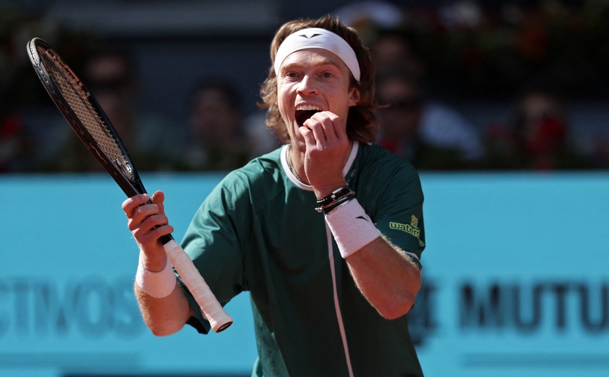 Russia's Andrey Rublev reacts as he plays against US' Taylor Fritz during the 2024 ATP Tour Madrid Open tournament semifinal tennis match at Caja Magica in Madrid on May 3, 2024. (Photo by Thomas COEX / AFP)
