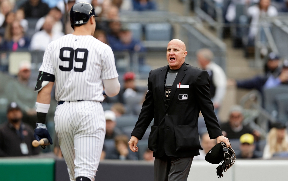 Home plate umpire Ryan Blakney has words with Aaron Judge #99 of the New York Yankees after ejecting him in the seventh inning of a game against the Detroit Tigers at Yankee Stadium on May 04, 2024 in New York City. (Photo by Jim McIsaac / GETTY IMAGES NORTH AMERICA / Getty Images via AFP)
