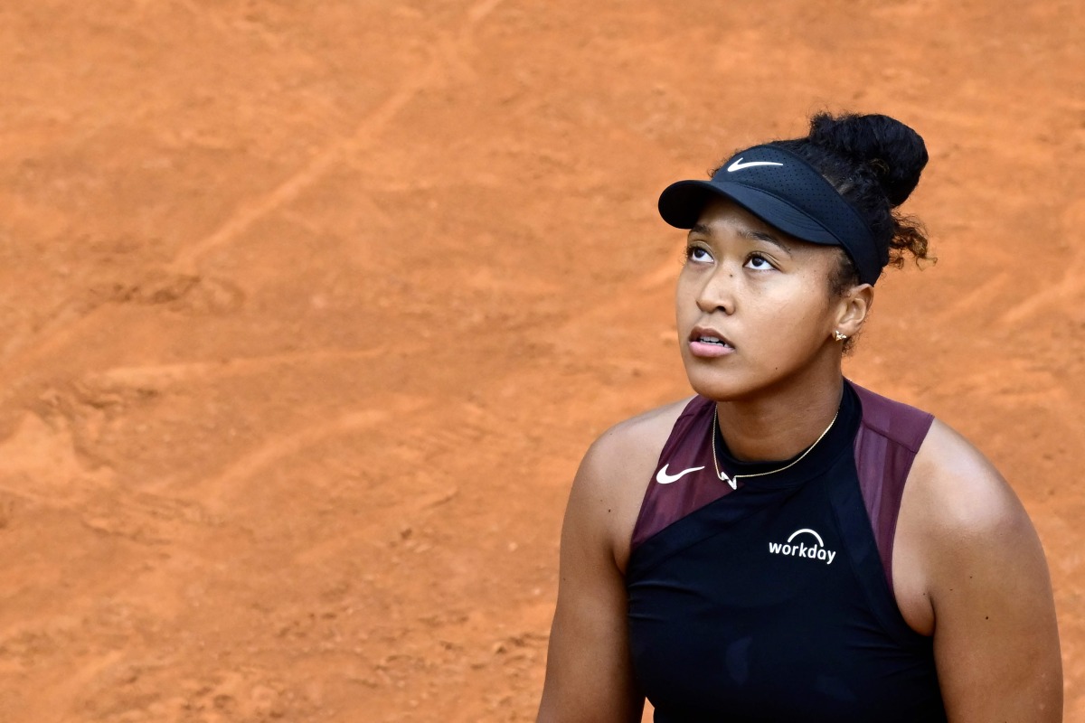 Japan's Naomi Osaka reacts during her match against France's Clara Burel at the Women's WTA Rome Open tennis tournament at Foro Italico in Rome on May 8, 2024. (Photo by Tiziana FABI / AFP)
