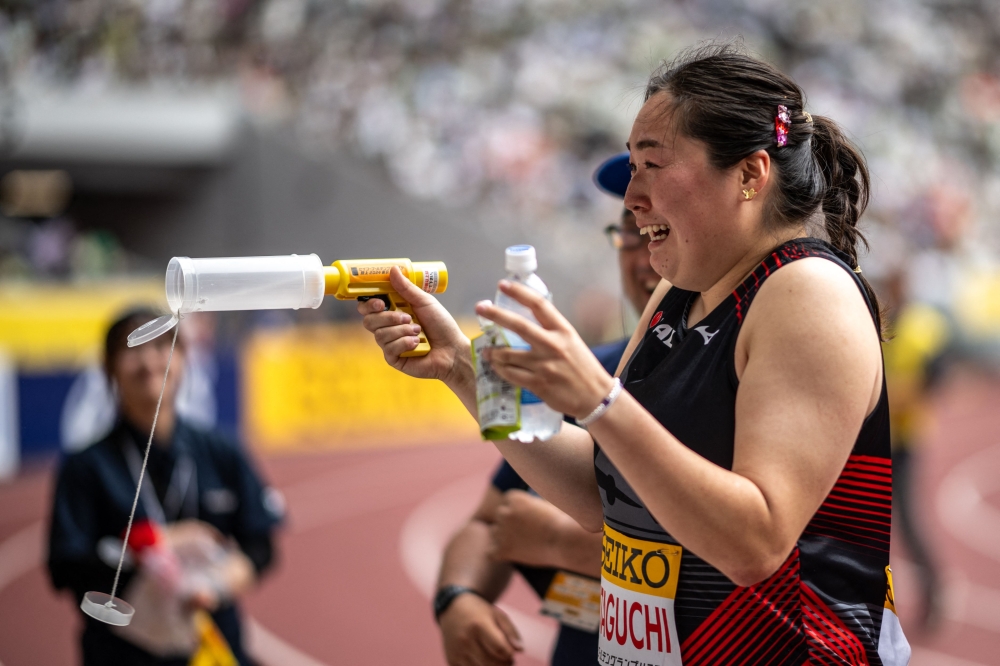 Japan's Haruka Kitaguchi celebrates her victory in the women's javelin throw during the Golden Grand Prix Japan at the National Stadium in Tokyo on May 19, 2024. (Photo by Philip Fong / AFP)