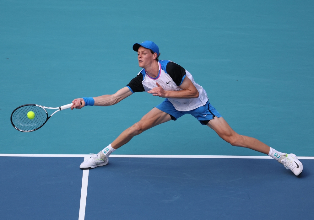 Jannik Sinner of Italy returns a shot against Tallon Griekpoor of the Netherlands during their match on Day 9 of the Miami Open at Hard Rock Stadium on March 24, 2024 in Miami Gardens, Florida. Al Bello/Getty Images/AFP

