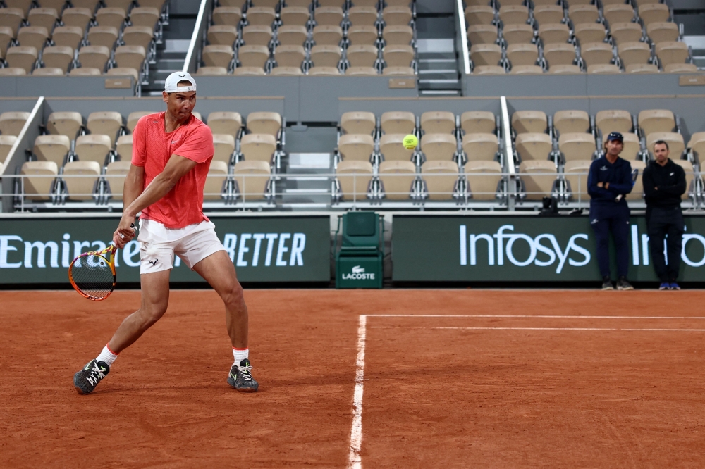 Spain's Rafael Nadal takes part in a practice session ahead of The French Open tennis tournament on Court Philippe-Chatrier at The Roland Garros Complex in Paris on May 22, 2024. (Photo by EMMANUEL DUNAND / AFP)