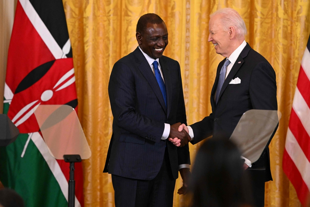US President Joe Biden and Kenya's President William Ruto during a joint press conference in the East Room of the White House in Washington, DC on May 23, 2024. (Photo by Roberto Schmidt / AFP)