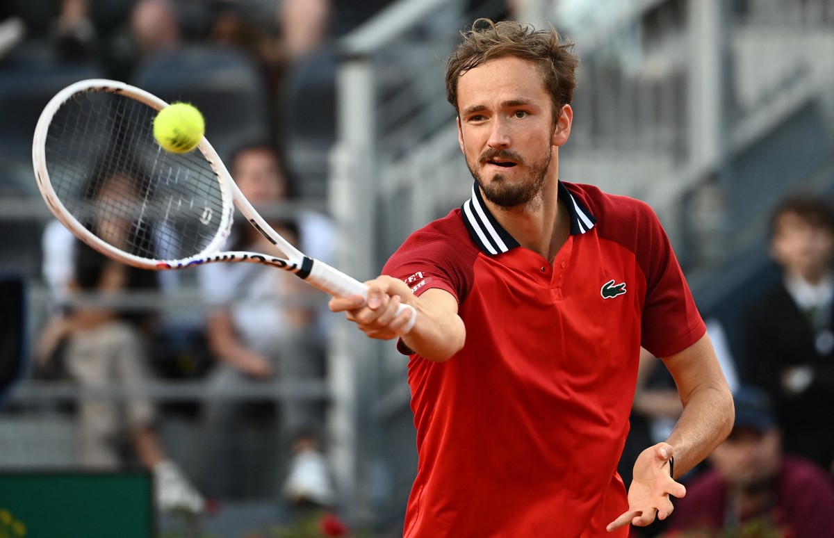 Russia's Daniil Medvedev plays a forehand return to US Tommy Paul during the Men's ATP Rome Open tennis tournament at Foro Italico in Rome on May 14, 2024. (Photo by Isabella BONOTTO / AFP)
