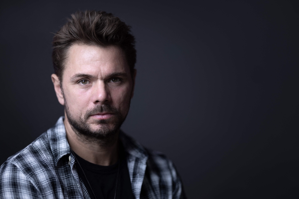 Swiss professional tennis player Stanislas Wawrinka poses during a photo session in Paris on May 23, 2024. (Photo by Joel Saget / AFP)