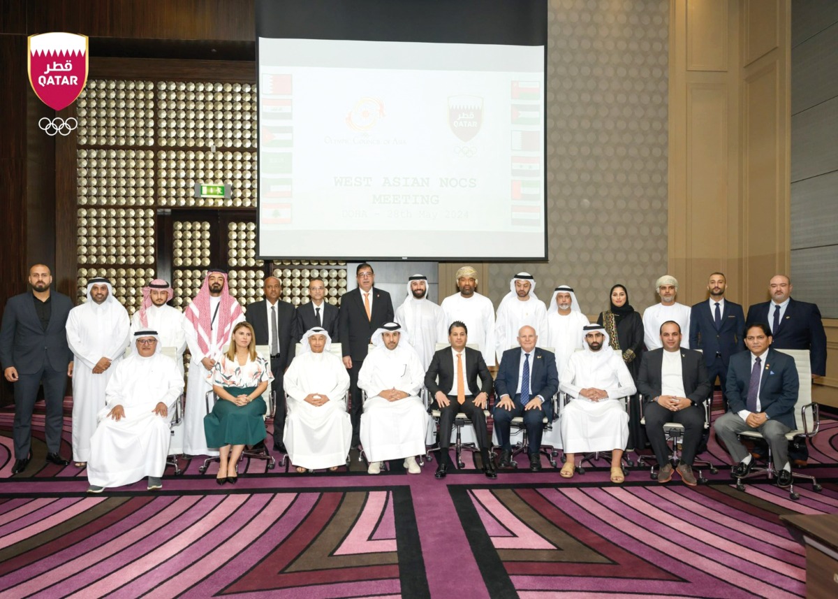 Officials pose for a photograph during the meeting of the National Olympic Committees of West Asian countries, in Doha yesterday.