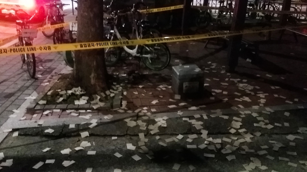 This handout photo taken on June 9, 2024 and provided by the South Korean Defence Ministry shows unidentified objects believed to be North Korean trash from balloons that crossed the inter-Korea border, on a street in Seoul. Photo by Handout / South Korean Defence Ministry / AFP