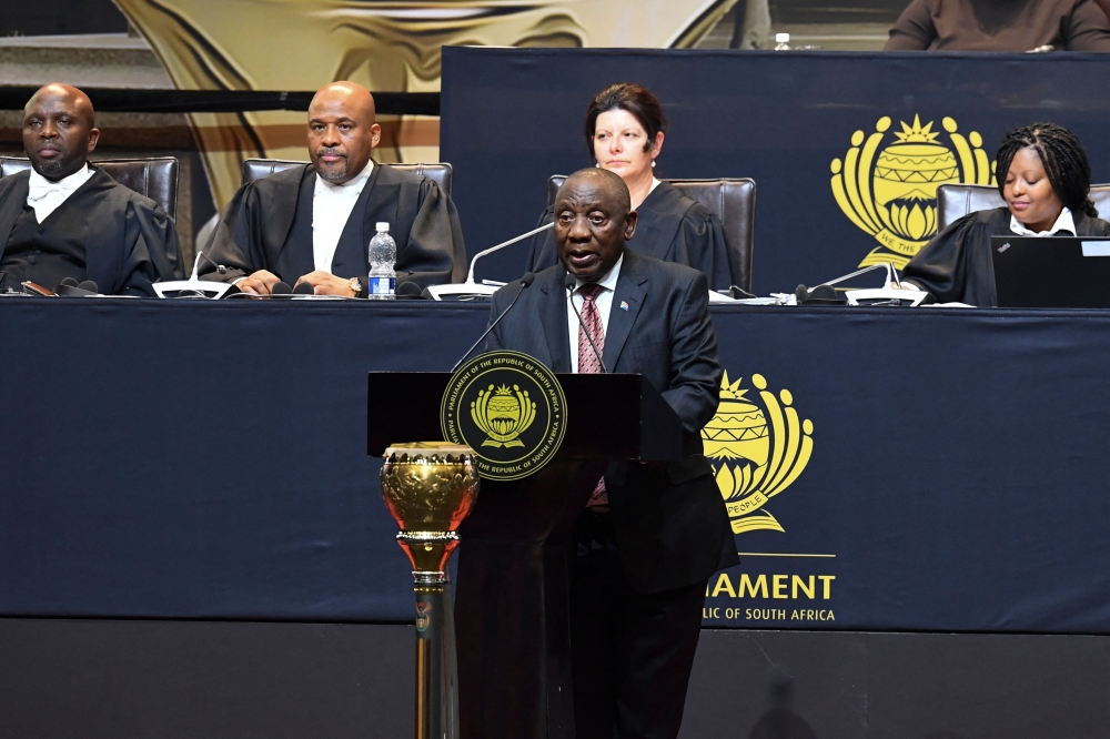 President of the African National Congress (ANC) Cyril Ramaphosa adresses members of parliament in Cape Town on June 14, 2024. (Photo by Rodger Bosch / AFP)
