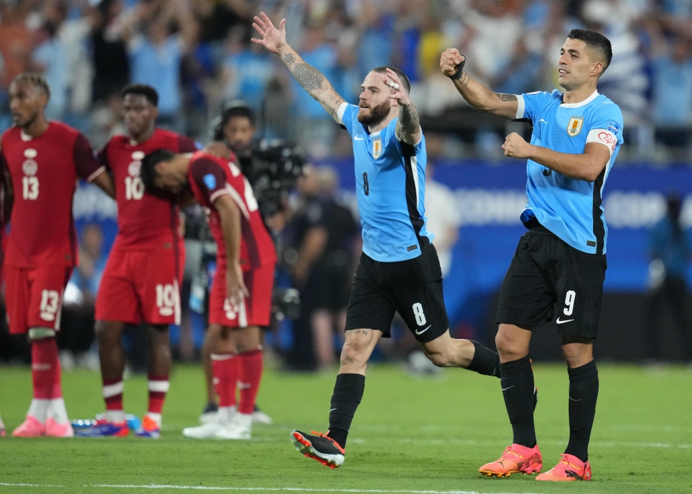 Luis Suarez of Uruguay and teammates celebrate winning in the penalty shootout on July 13, 2024 in Charlotte, North Carolina. Grant Halverson/Getty Images/AFP 