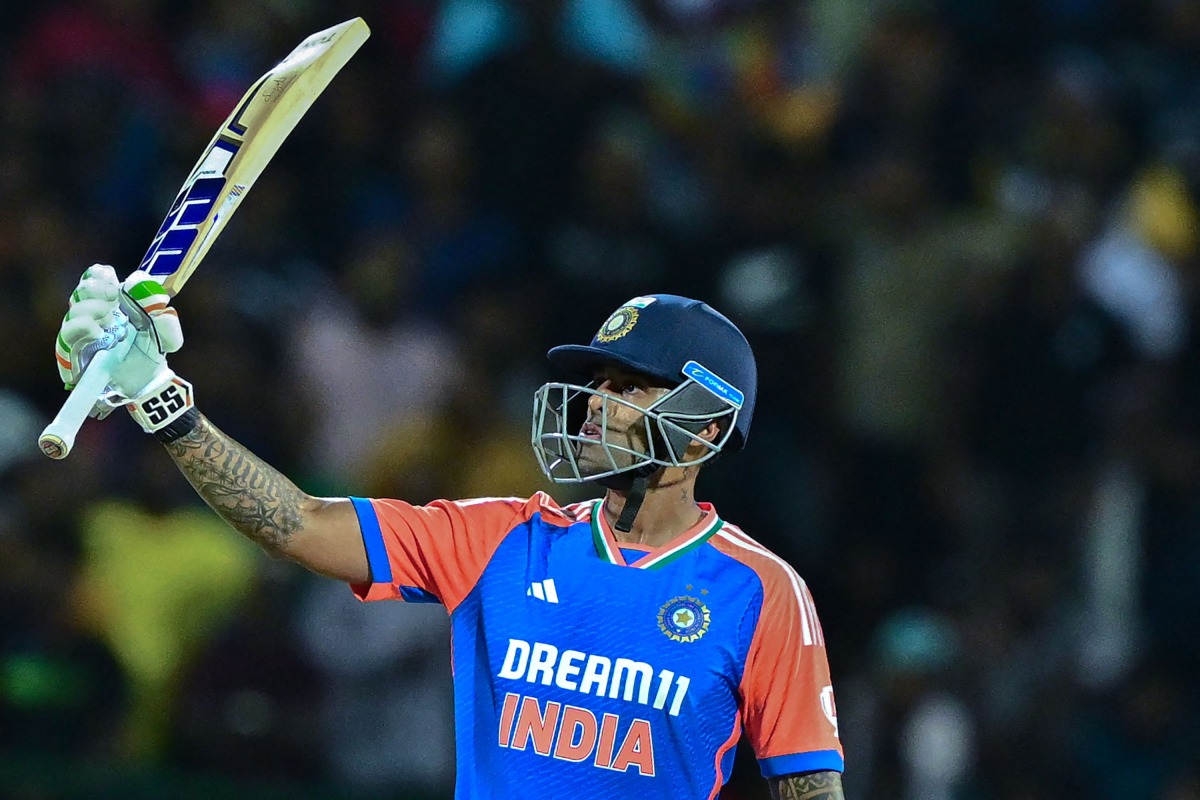 India's captain Suryakumar Yadav celebrates after scoring a half-century (50 runs) during the first Twenty20 international cricket match between Sri Lanka and India at the Pallekele International Cricket Stadium in Kandy on July 27, 2024. (Photo by Ishara S. KODIKARA / AFP)
