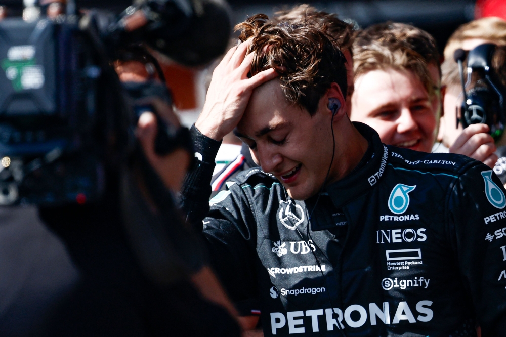 Mercedes' British driver George Russell reacts after winning the Formula One Belgian Grand Prix at the Spa-Francorchamps Circuit in Spa on July 28, 2024. (Photo by SIMON WOHLFAHRT / AFP)